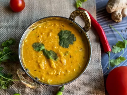 Thechwani is a traditional Kashmiri delicacy of crushed radish slow-cooked in a fragrant, spice-rich gravy, offering a rustic blend of warmth and bold flavors.
