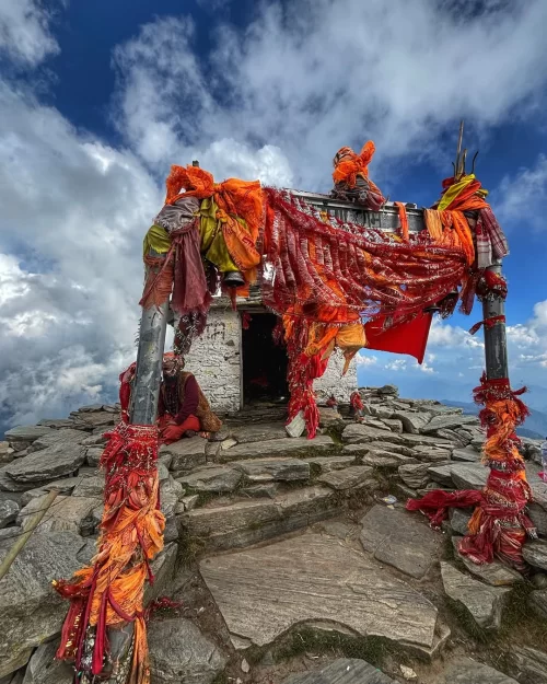 Tungnath Temple, Uttarakhand – sacred high-altitude shrine adorned with prayer flags featured in Uttarakhand tour packages