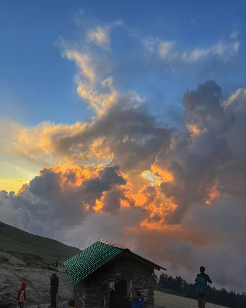 Tungnath, Uttarakhand – vibrant sunset clouds over mountain trail featured in Uttarakhand tour packages
