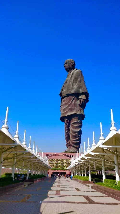 Statue of Unity in Kevadia Gujarat with grand walkway and clear blue sky highlighting iconic monument attraction in Gujarat tour packages