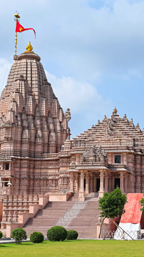 Grand Hindu temple in Rajkot Gujarat showcasing intricate carvings and traditional architecture a prominent spiritual attraction included in Gujarat tour packages