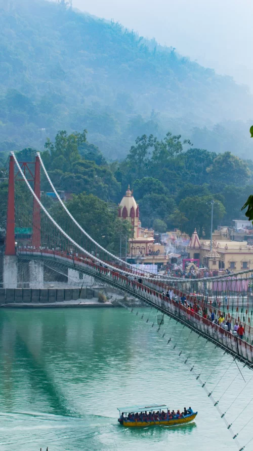 Ram Jhula, Rishikesh – iconic suspension bridge over Ganga River featured in Uttarakhand tour packages