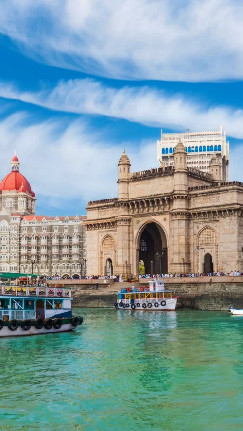 Gateway of India Mumbai historic seaside monument with Taj Mahal Palace hotel and Arabian Sea view in Maharashtra India Maharashtra tour packages