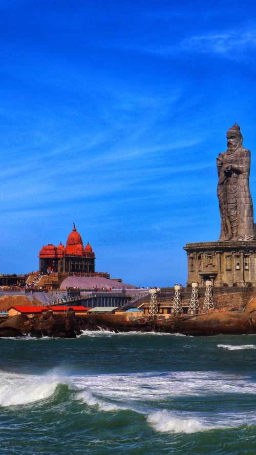 Thiruvalluvar Statue and Vivekananda Rock Memorial at Kanniyakumari, Tamil Nadu, overlooking the meeting point of three seas, a famous coastal landmark featured in Tamil Nadu tour packages.