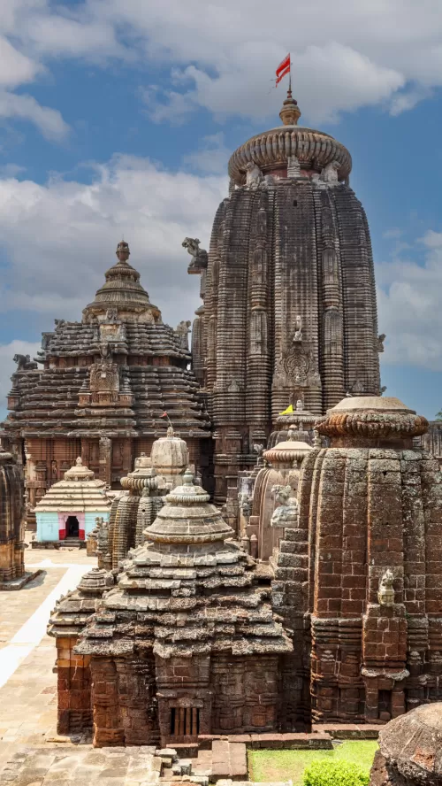 Ancient Lingaraj Temple in Bhubaneswar Odisha with intricate stone carvings and towering spire featured in Odisha tour packages