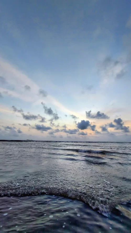 Alibaug Beach scenic Arabian Sea coastline with waves and sunset sky view in Alibaug Maharashtra India Maharashtra tour packages
