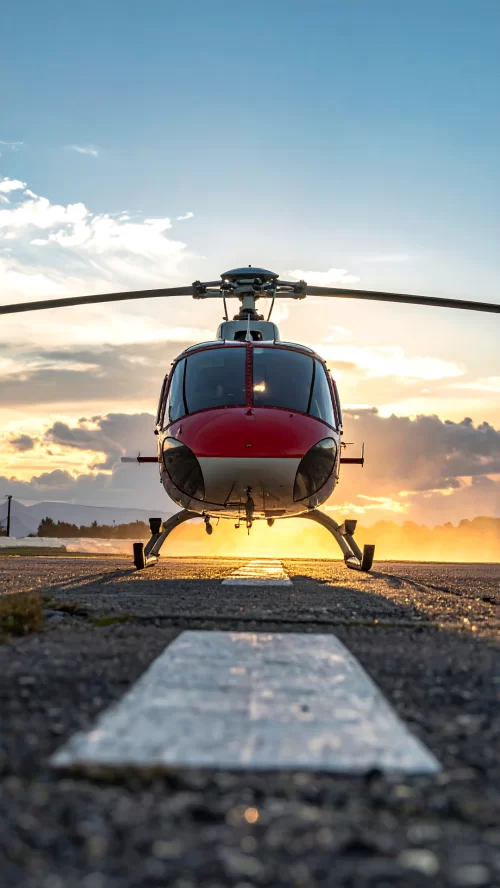 Char Dham Yatra helicopter Uttarakhand India red chopper landing runway sunrise aerial pilgrimage Kedarnath Badrinath travel service Uttarakhand tour package