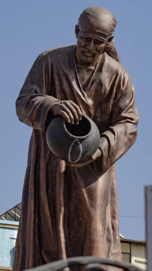 Shirdi Sai Baba statue sacred pilgrimage site and famous temple town in Shirdi Maharashtra India Maharashtra tour packages