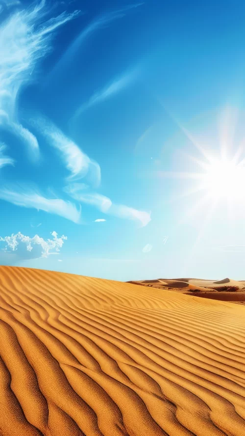 Thar Desert sand dunes in Jaisalmer Rajasthan during sunny day, featuring golden ripples and blue sky, perfect adventure experience Rajasthan tour package