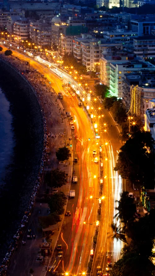 Mumbai night skyline with Marine Drive illuminated city lights and coastal road view in Maharashtra India Maharashtra tour packages