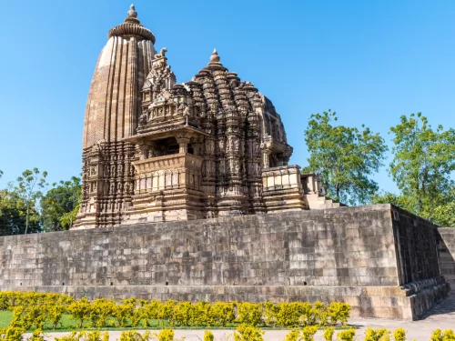 Vamana Temple Khajuraho Eastern Group UNESCO site, Nagara-style Vishnu dwarf avatar shrine intricate apsaras carvings Chandela dynasty 1050-1075 AD, ideal Madhya Pradesh heritage temple tour package.
