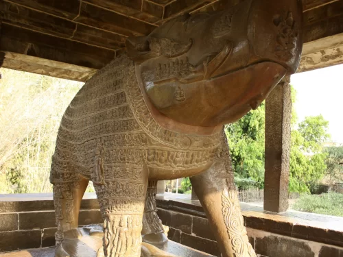 Varaha Temple Khajuraho monolithic boar Vishnu avatar sculpture, 2.6m sandstone carving 674 deities Chandela dynasty 900-925 AD Western Group UNESCO site, ideal Madhya Pradesh heritage tour package.