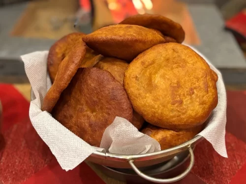 Babru in crispy fried lentil batter with spice coating, authentic Indian Himachali snack, steaming hot delight.