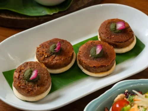 Taj Mahal at Agra during sunset, featuring water reflections, perfect romantic experience Uttar Pradesh tour package.