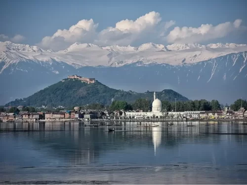 Hazratbal Shrine mosque on Dal Lake Srinagar with Hari Parbat fort Zabarwan snow peaks reflection featured in Kashmir Srinagar tour packages