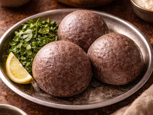 Hampi ruins at Karnataka during sunset, featuring the Stone Chariot and boulder landscape, adventure Karnataka tour package.