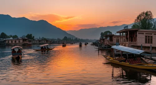 Shikara ride at Dal Lake Srinagar during sunset, featuring houseboats and mountains, romantic Srinagar tour package.
